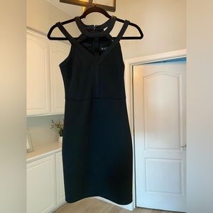 Black dress by Guess size 0, wore once, good condition.